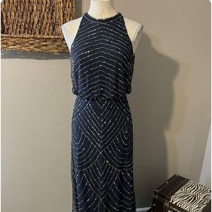 Worn once for a bridal party, no longer needed. Purchased at the bay for 250.